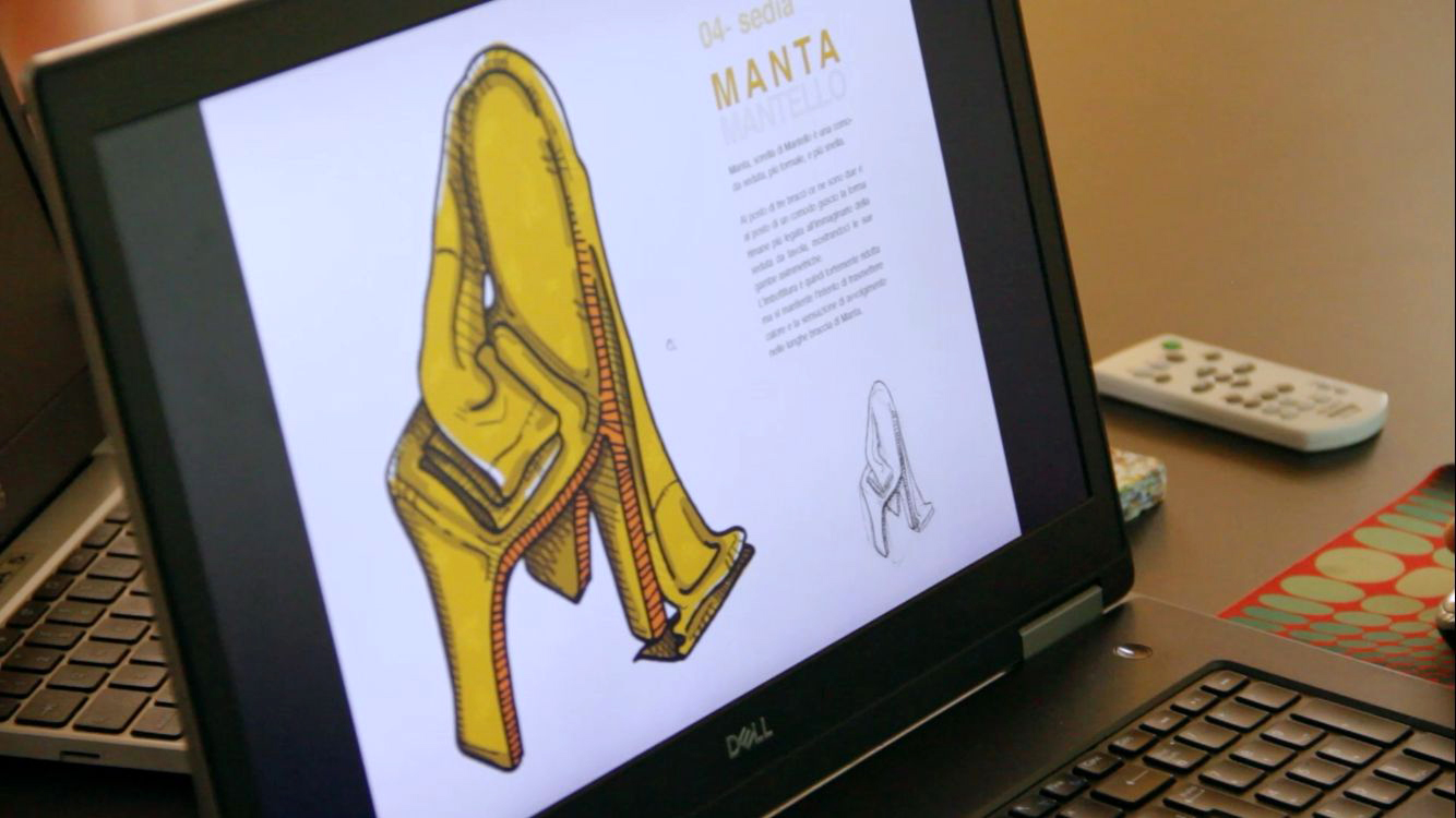 Schizzo di una sedia gialla con design innovativo sullo schermo di un laptop, design chiamato Manta.