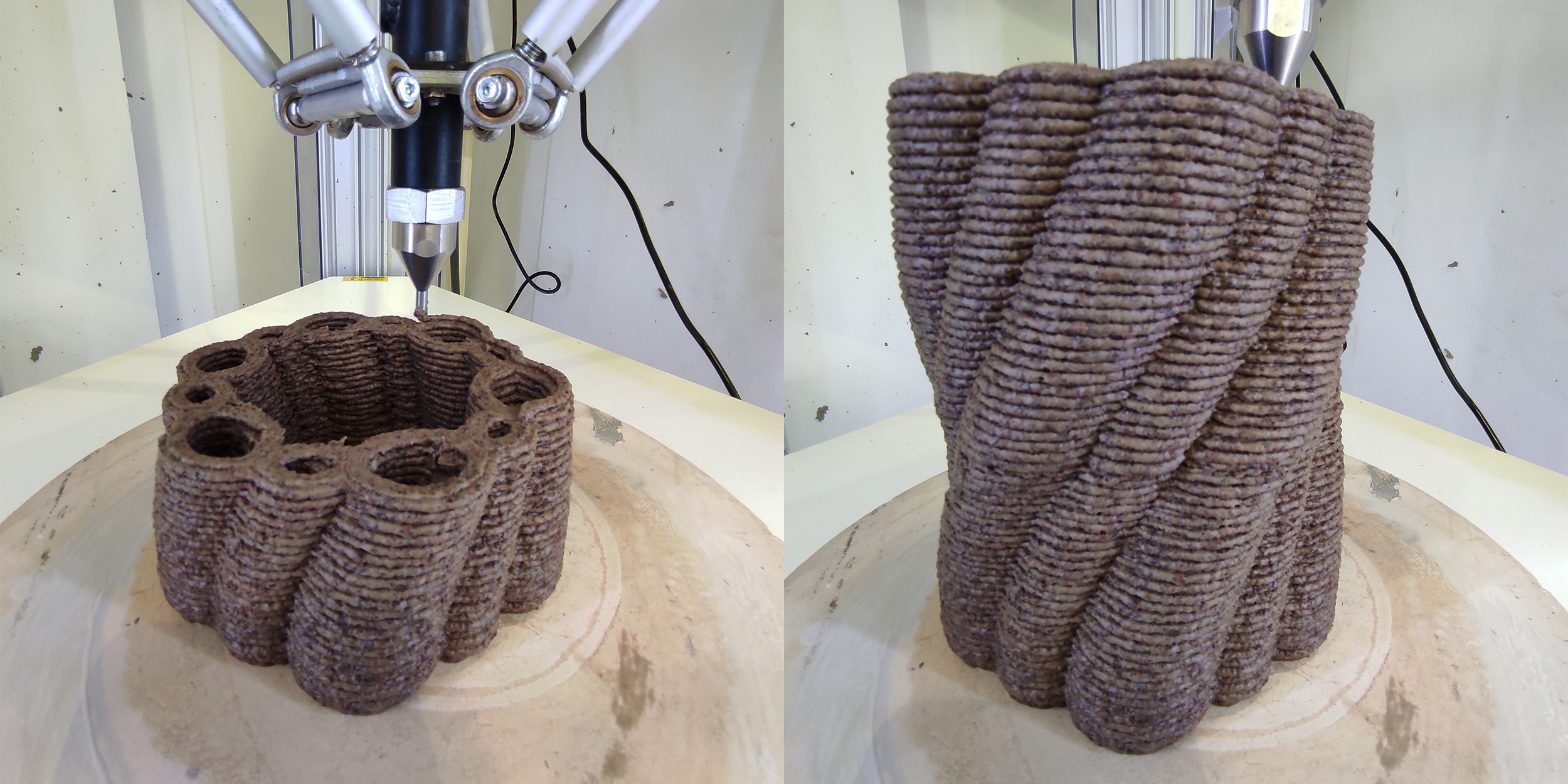 Stampante 3D crea oggetto in terra, struttura a spirale su piatto di stampa, primo piano del processo.